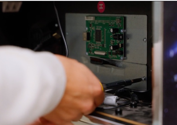 Soldering a display driver board inside a monitor